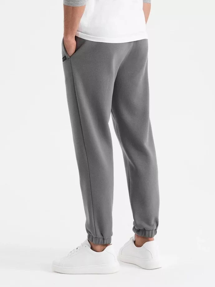 Unisex laisvalaikio tamsiai pilkos kelnės Argan