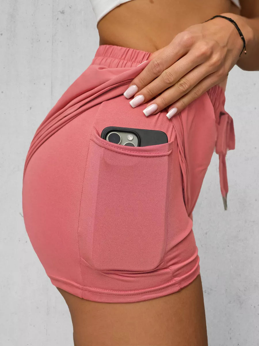 Moteriški sportiniai rausvi šortai Boni