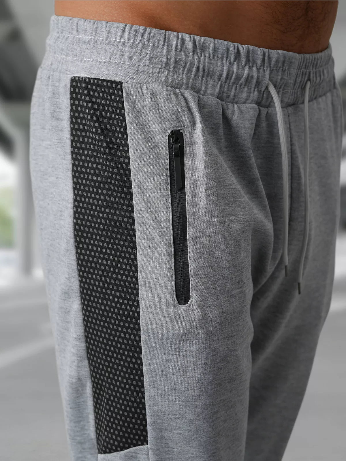 Vyriškos šviesiai pilkos laisvalaikio kelnės Emit