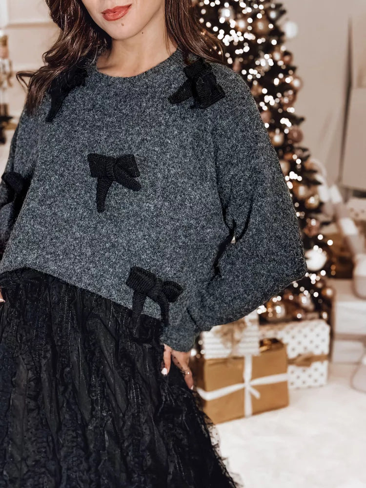 Moteriškas juodas megztinis Bow