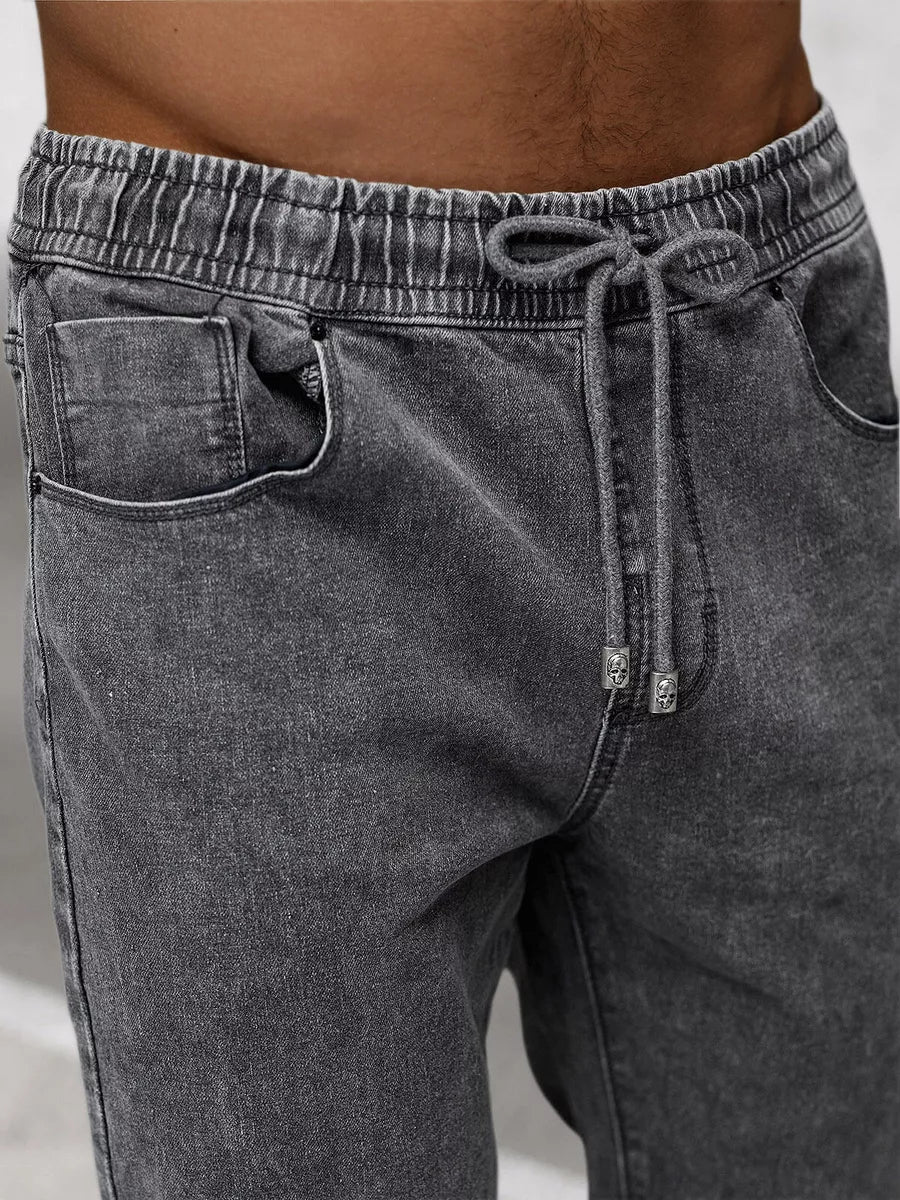 Tamsiai pilki vyriški jogeriai Nilum