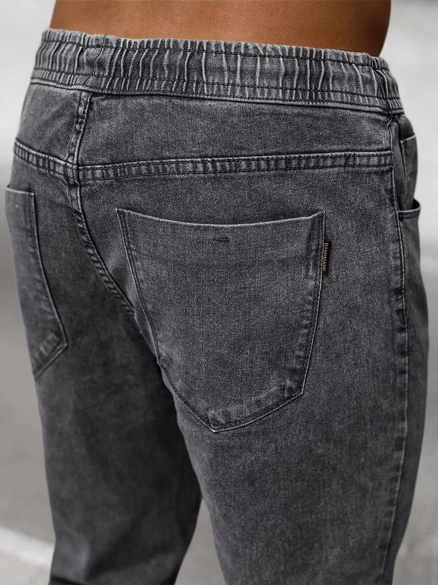 Tamsiai pilki vyriški jogeriai Nilum