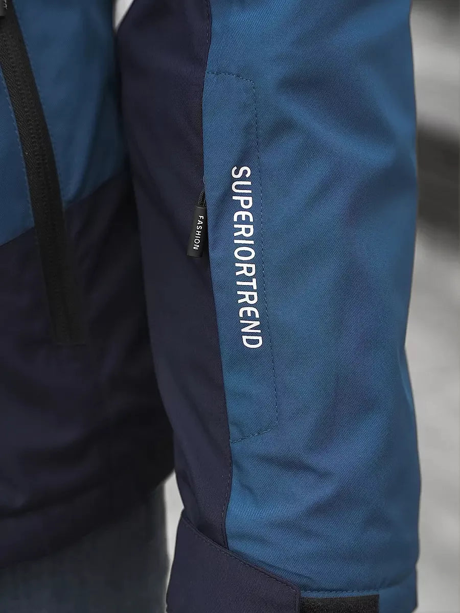 Mėlyna - tamsiai mėlyna striukė vyrams Trend